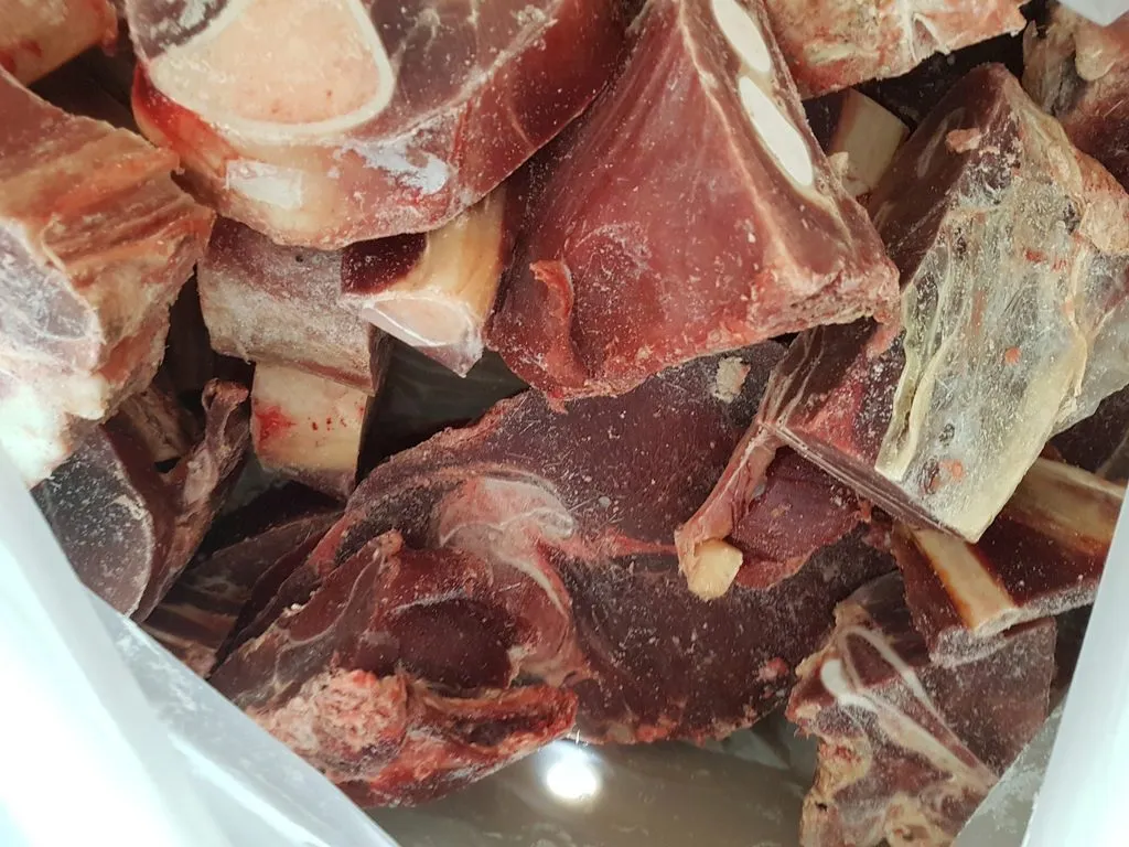 фотография продукта мясо говядины на кости (распил)
